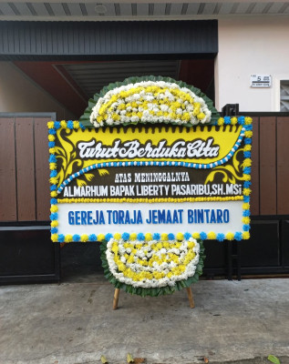 Papan Bunga Duka di Glagah